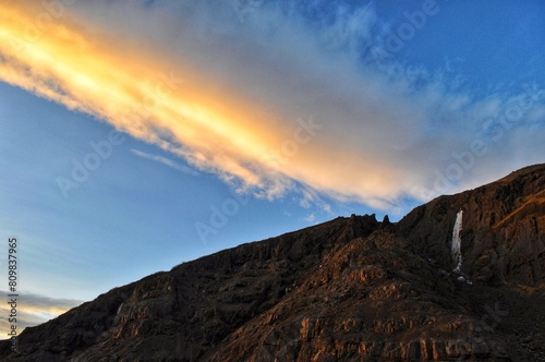 Iceland Landscape with Stripe Cloud during Sunset