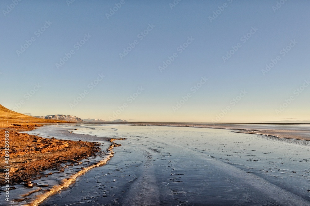 Icelandinc Landscape at Sunset in Winter with Ice Icelandinc Landscape at Sunset in Winter with Ice