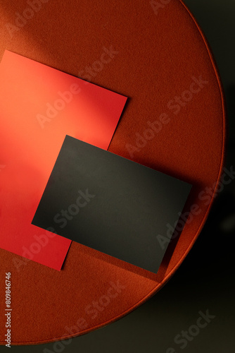 mockup page branding on orange fabric couch, stationery set