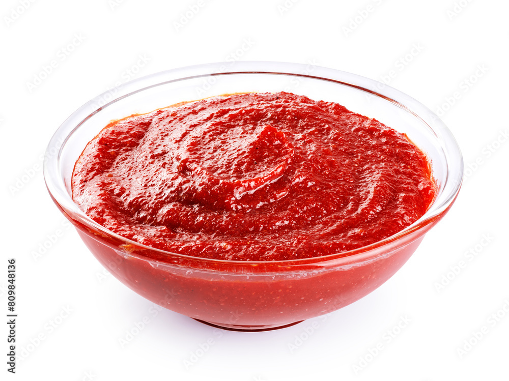 Gochujang Korean traditional spicy fermented sauce in a bowl isolated on white background. With clipping path. Gochujang Korean traditional spicy fermented sauce in a bowl isolated on white background. With clipping path.