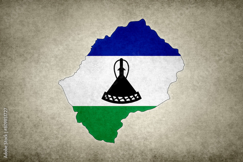 Map of Lesotho with its flag on a paper photo