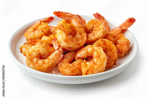 a white bowl filled with shrimp on top of a white table