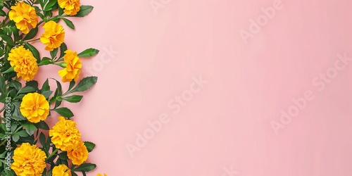Yellow marigolds and ivy branches create a lush border along the left edge of a light pink background, providing copy space on the right for a birthday note