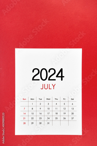 July 2024 calendar page with push pin on red