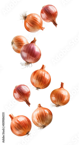 Brown onions falling up over isolated transparent background