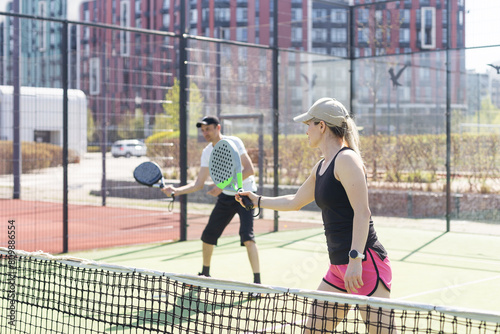 Padel lesson with a coach  personalized instruction in a supportive environment.