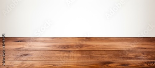 A brown wooden tabletop is situated on a white background with plenty of space for images. Creative banner. Copyspace image photo