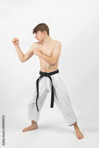 A Shirtless Teenage Karate Boy