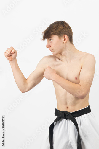 A Shirtless Teenage Karate Boy