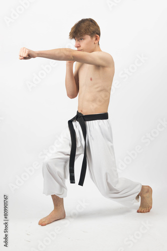 A Shirtless Teenage Karate Boy