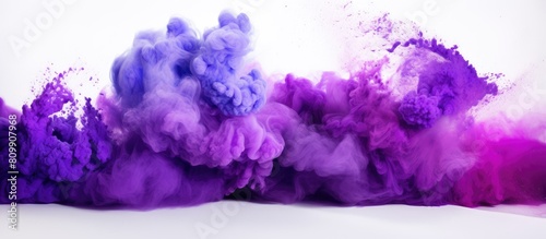 A vibrant explosion of purple color powder is captured in a freeze frame on a white backdrop creating a visually striking copy space image 135 characters