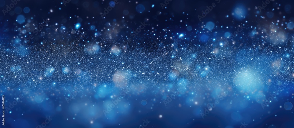 Abstract gradient dark blue light silver sparkle backdrop with navy blue color shiny glitter Christmas texture Perfect for bokeh copy space image Abstract gradient dark blue light silver sparkle backdrop with navy blue color shiny glitter Christmas texture Perfect for bokeh copy space image