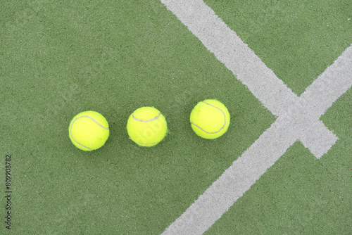 Tennis ball on green grass © Angelov