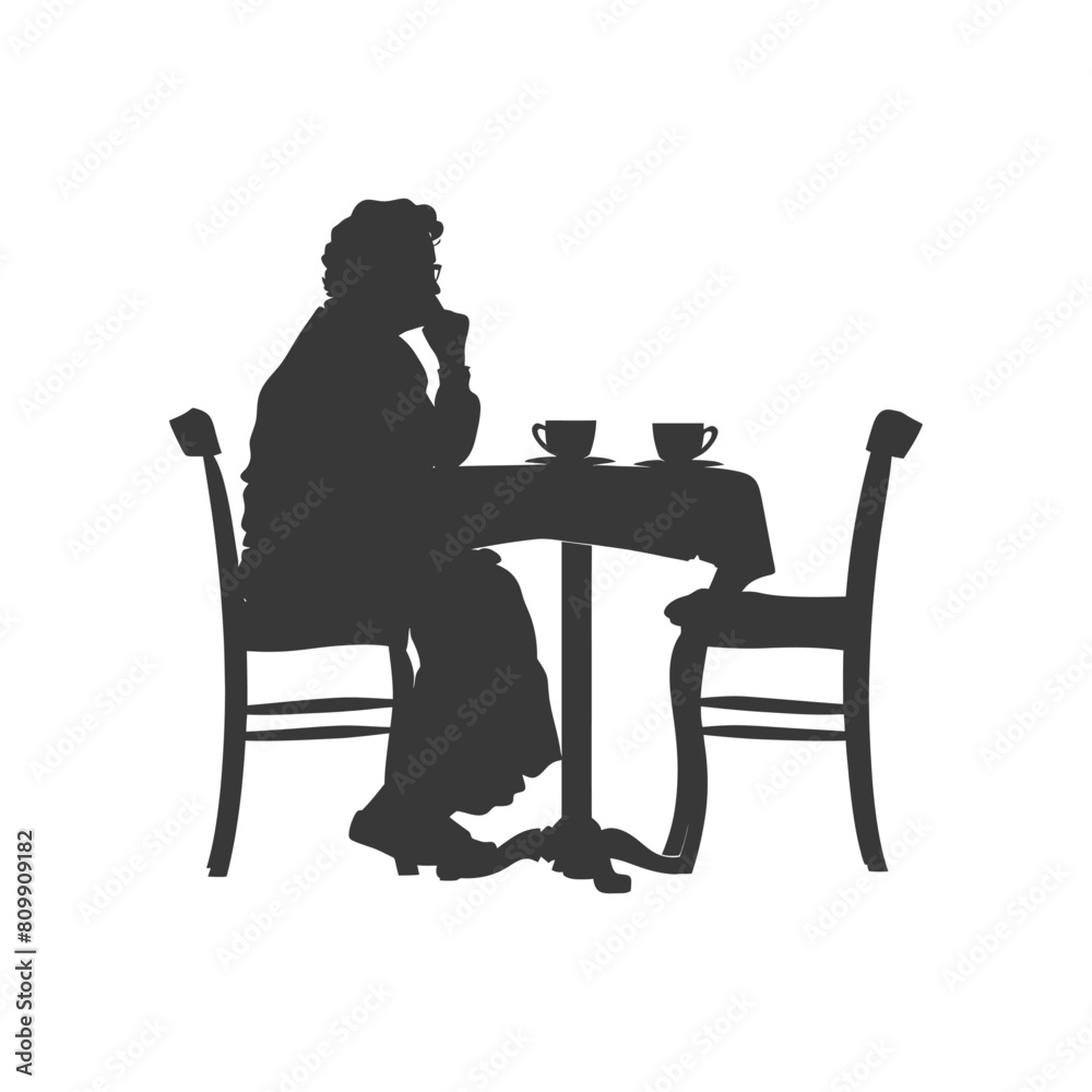 Silhouette elderly woman sitting at a table in the cafe Silhouette elderly woman sitting at a table in the cafe