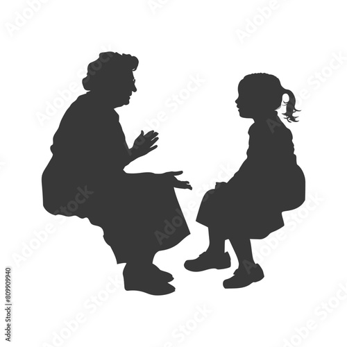 Silhouette elderly women and little girl were sitting while talking black color only