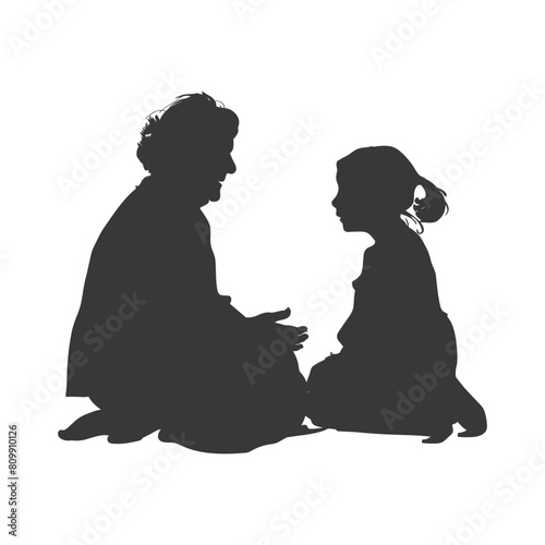 Silhouette elderly women and little girl were sitting while talking black color only