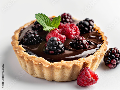 A chocolate tart with raspberries on top