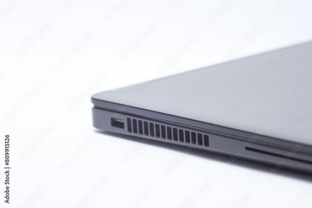 Closed black laptop closeup on white background Closed black laptop closeup on white background