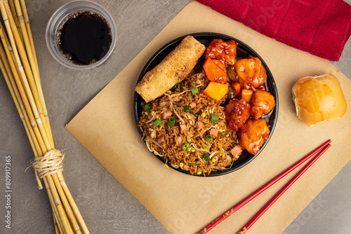 Comida China, arroz, lumpias, pollo agridulce photo