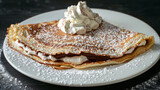 Classic croatian palacinke with chocolate spread, powdered sugar, and whipped cream on a white plate