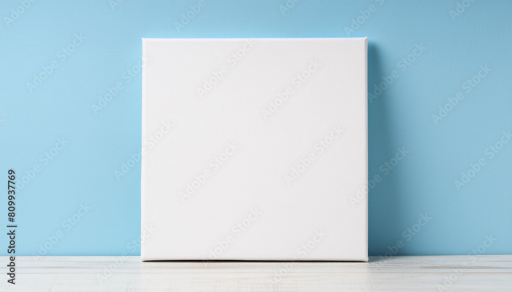 Mock-up of blank white poster frame on bright blue background. Mock-up of blank white poster frame on bright blue background.