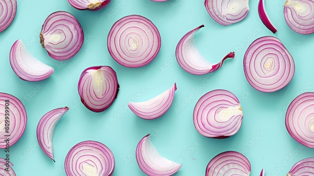 Onion slices and whole, shot from above, making a fun pattern on a bright pastel color background, magazine cover photo Onion slices and whole, shot from above, making a fun pattern on a bright pastel color background, magazine cover photo