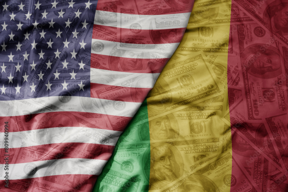 big waving colorful flag of united states of america and national flag of mali on the dollar money background. finance concept . big waving colorful flag of united states of america and national flag of mali on the dollar money background. finance concept .