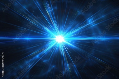 Bright blue star burst on a dark black background, suitable for various designs photo
