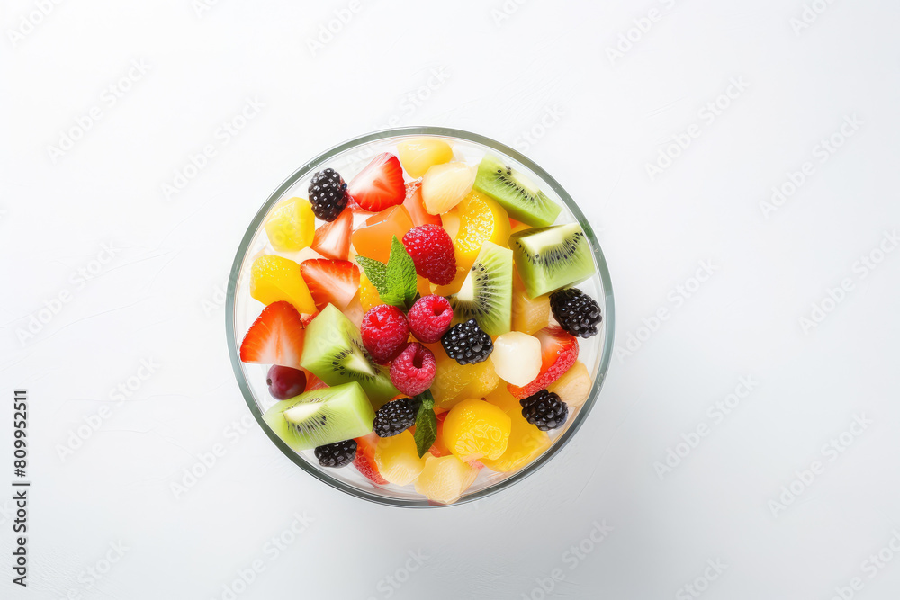 Colorful Fresh Fruit Salad in Glass Bowl Top View