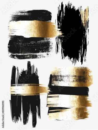 A collection of bold black and shimmering gold brush strokes on a canvas, creating a striking contrast and dynamic visual impact