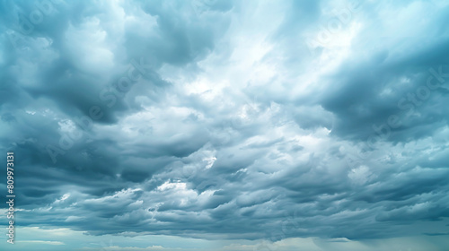 Realistic photo of dramatic storm clouds with large, swirling patterns,