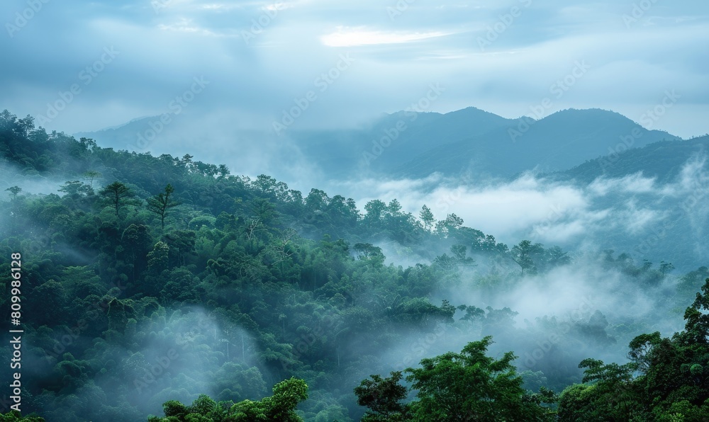 Hazy sky and thin layers of clouds, mist in the mounts