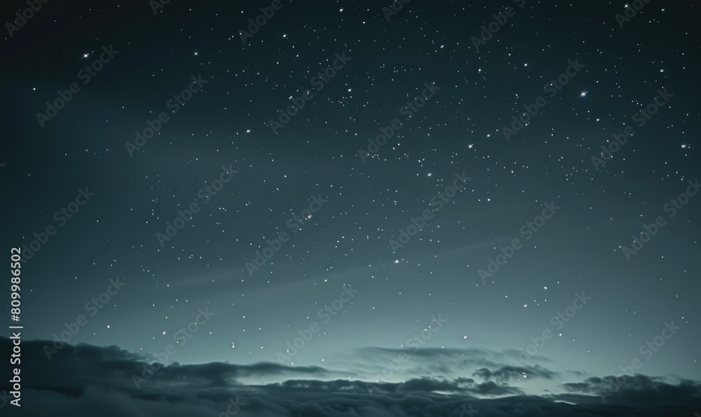 Fototapeta premium A hazy night sky with thin cirrostratus clouds