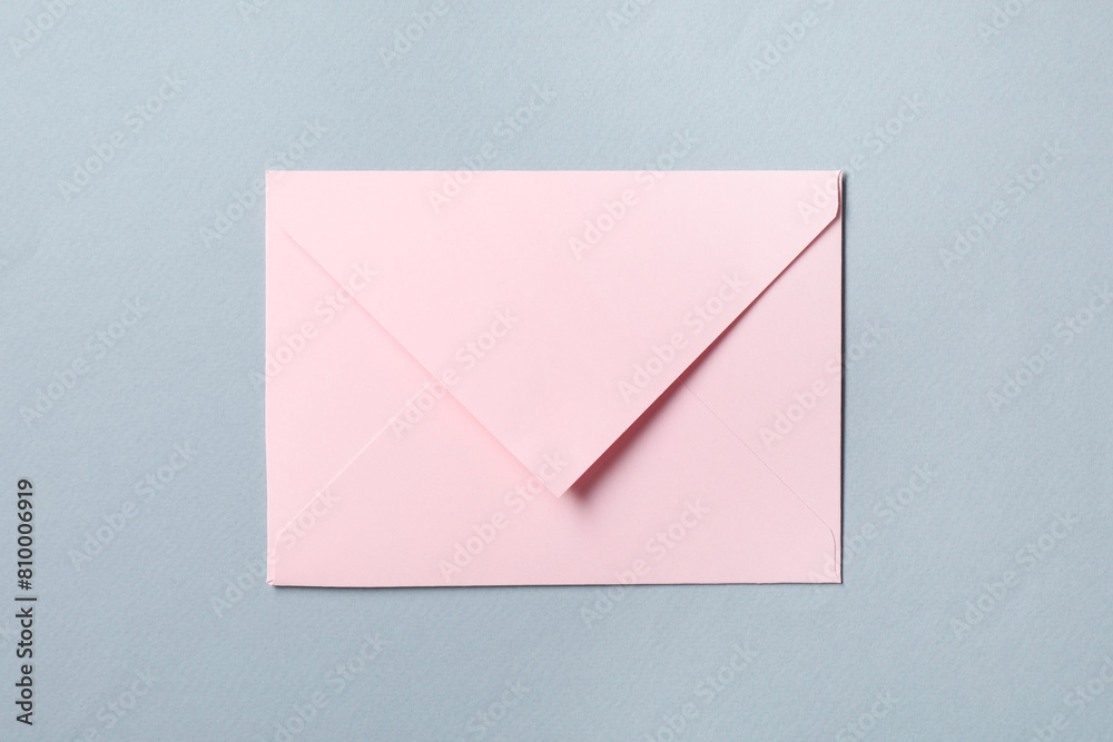 Letter envelope on grey background, top view Letter envelope on grey background, top view