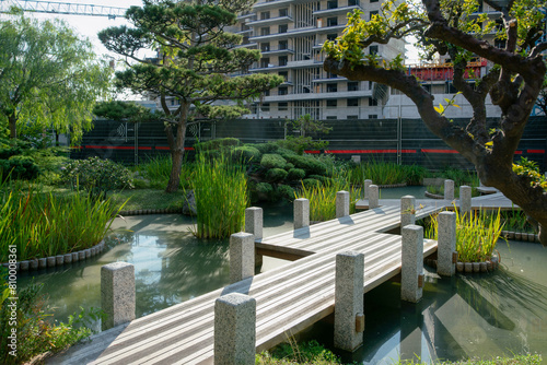 Amazing zigzag wooden bridge in Japanese garden of Monaco