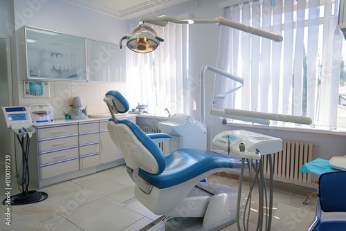 A dentist utilizes modern equipment, like an intraoral scanner or digital X-ray machine.