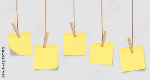 vertical postits hanging from string
