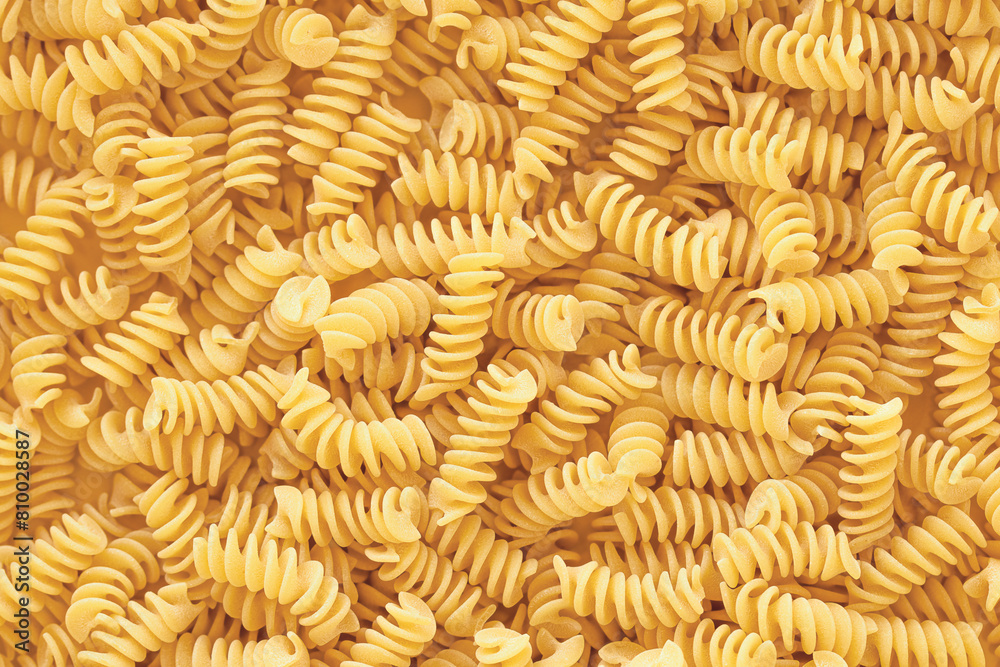 Stack of Uncooked Fusilli, Abstract Backdrop. Stack of Uncooked Fusilli, Abstract Backdrop.