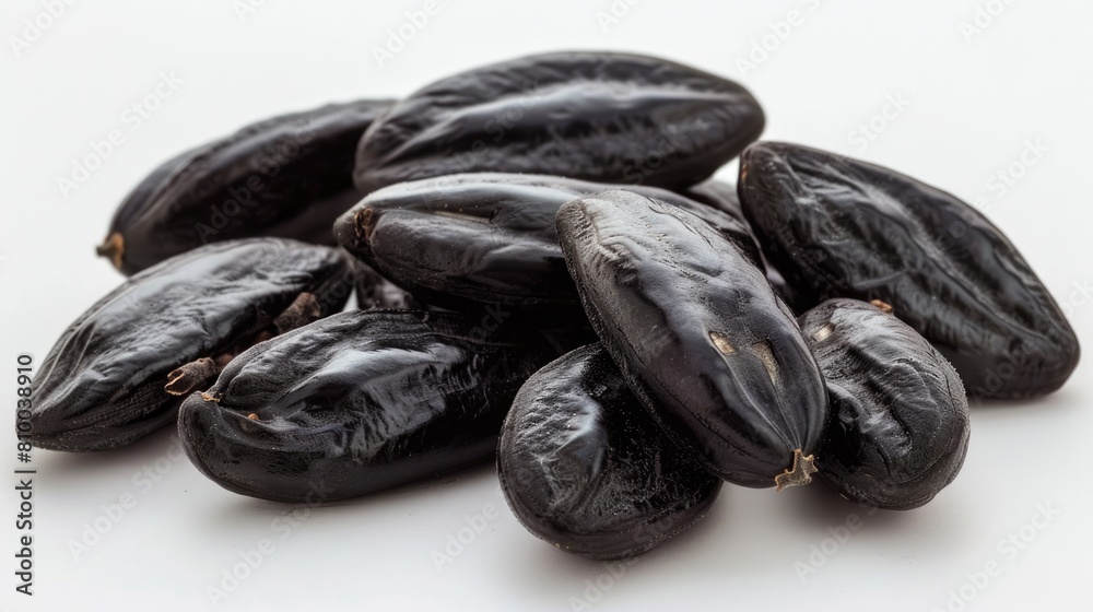Exotic Caribbean Spice: Closeup of Black Tonka Beans, a Sweet and Epicure Spice used in Food Exotic Caribbean Spice: Closeup of Black Tonka Beans, a Sweet and Epicure Spice used in Food