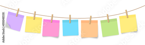 horizontal postits hanging from string colored