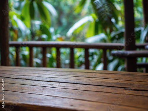 Jungle Retreat, Wooden Table with Softly Blurred Jungle Background © xKas