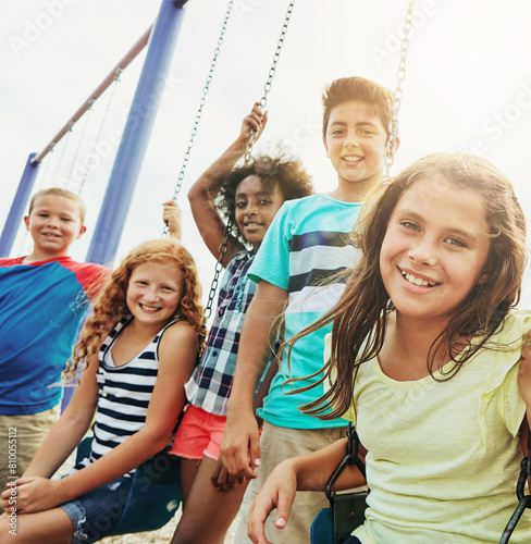Portrait, children or kids in park outdoor playing together for friendship, bonding and relationship development. Happy, young people and swing on jungle gym for childhood fun or summer break