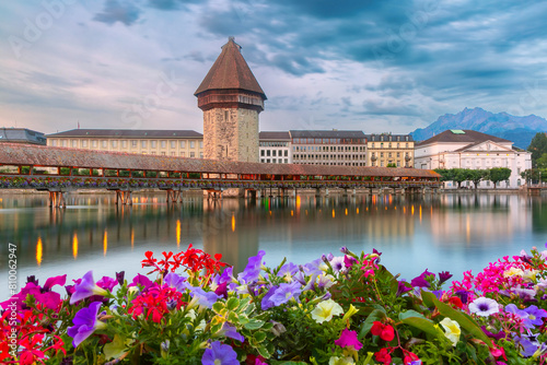 Twilight view of historic Chapel Bridge and Water Tower in Lucerne, Switzerland (ID: 810062947)