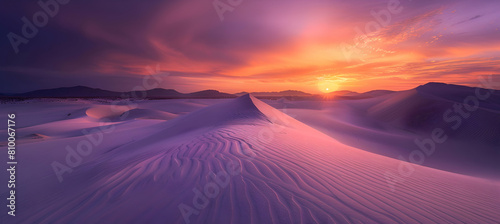 A vibrant sunset over coastal sand dunes  with the sky painted in hues of orange and purple  reflecting lightly on the undulating sand patterns