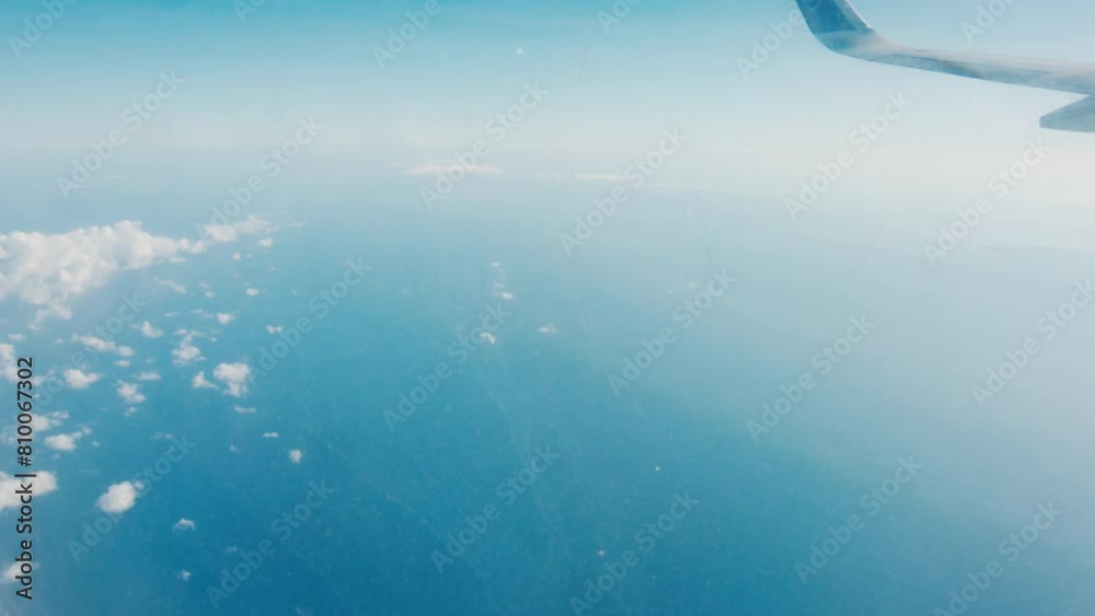 Window view from the airplane flying over Indonesia Window view from the airplane flying over Indonesia
