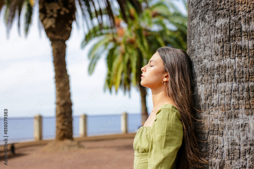 Young Hispanic Woman Breathing Fresh Air Outdoors Young Hispanic Woman Breathing Fresh Air Outdoors