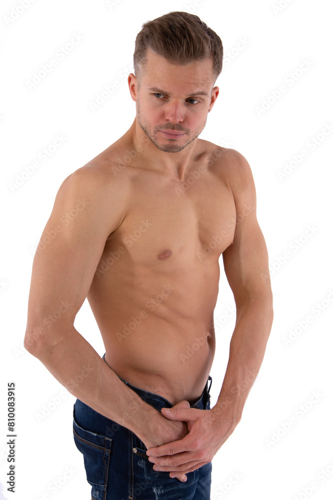 Young attractive man posing in the studio. Young attractive man posing in the studio.