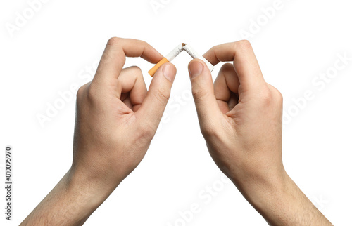 Stop smoking. Man holding broken cigarette on white background, closeup © New Africa