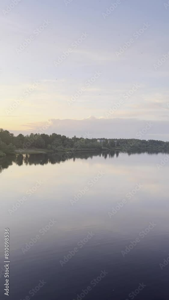 clouds over the river, forest on the horizon clouds over the river, forest on the horizon