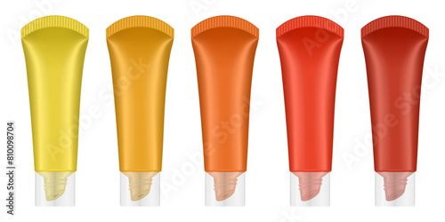 Set of lip gloss tubed. Lip, eye cream, serum. Cosmetic product container mockup. Yellow, orange, red and brown bottles with transparent cap	